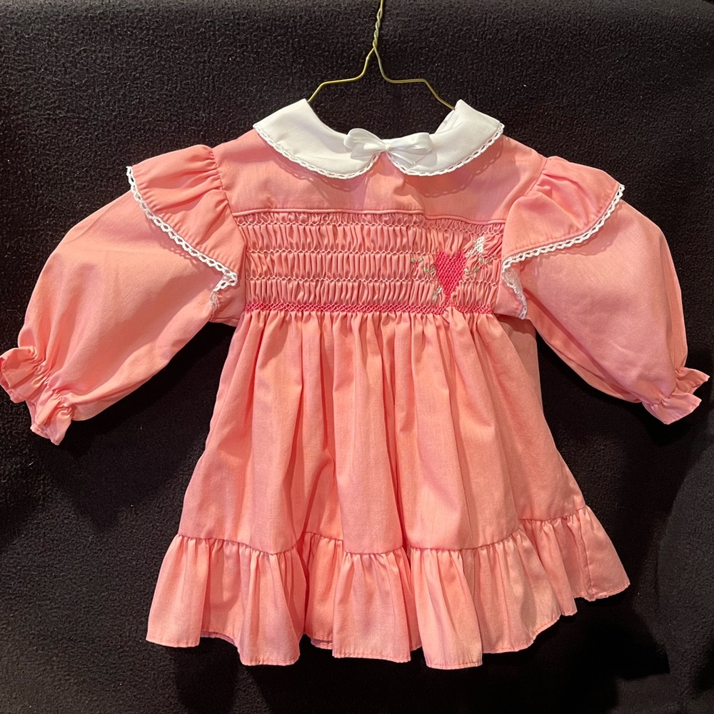 Vintage infant girl’s smocked dress by Polly Flinders, peach, sz. 12 mos